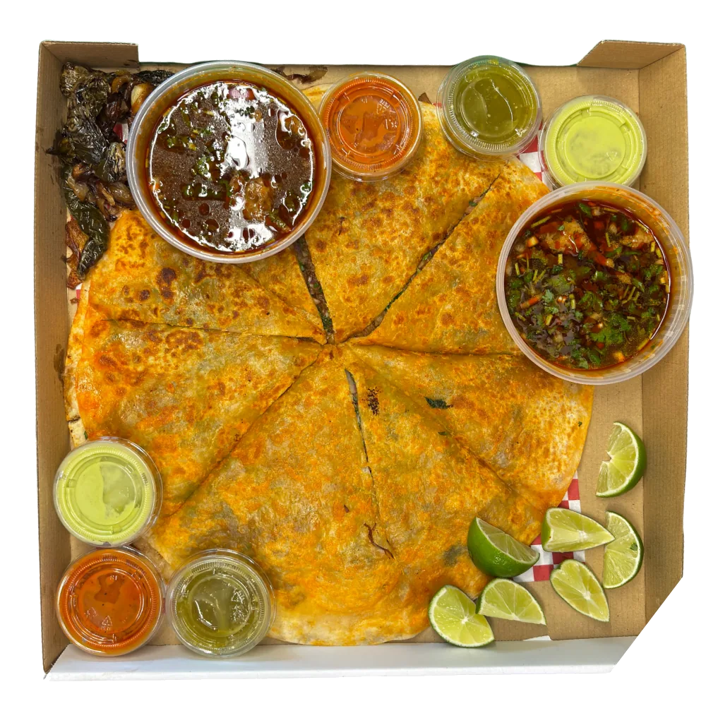 Pizza de Birria — family-size birria pizza with a spread of house salsas and lime